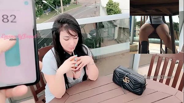 PUBLIC Sexy gorgeous brunette being teased by a guy controlling her vibrator through the cell phone while she moan and cum outdoor