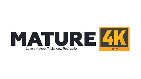 MATURE4K. Mature woman makes it with pretty shy man in the courtyard