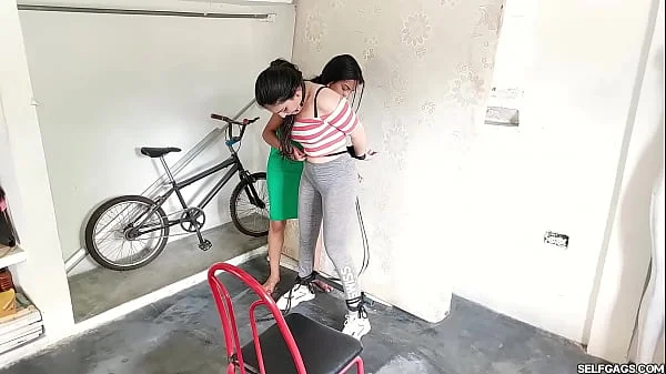 Bitchy Step-Sister Ball Gagged In Lesbian Strappado Bondage