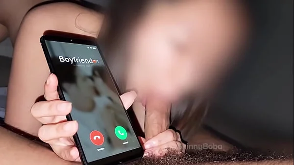 Japanese student sucking dick while her boyfriend calls