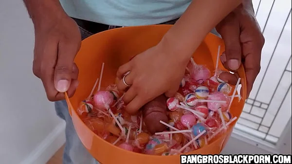 Black girl dressed with a nurse costume collecting more than just candies at this house...