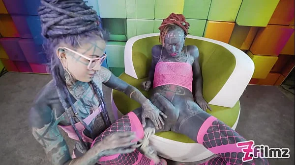 Dominatrix teases and pushes heavily tattooed SISSY to anal orgasm with doxy, anal fuckmachine and cockbondage