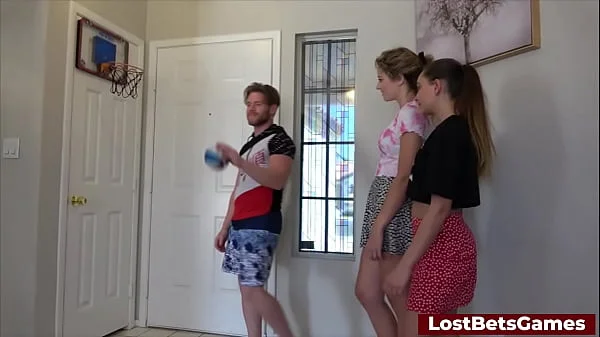 A strip indoor basketball game with two hot girls and 1 lucky dude