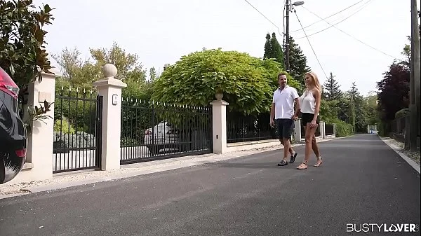 Busty lovers Peneloppe Ferre's titties sucked while riding cock in cowgirl