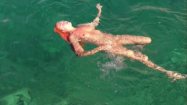 Blue water and a naked girl!