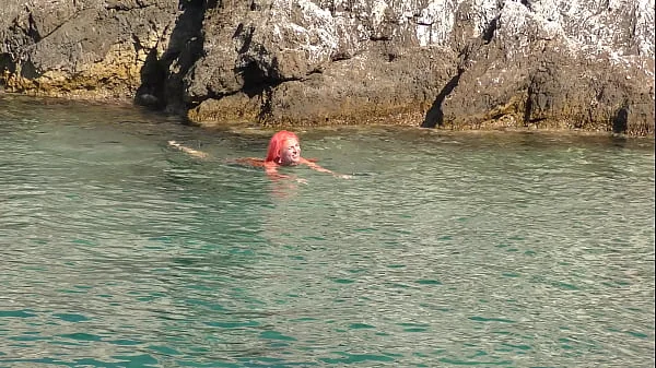 Blue water and a naked girl!