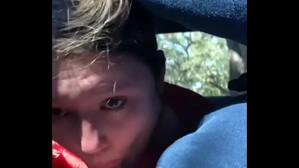 Dirty hooker sucks cock in car BJ