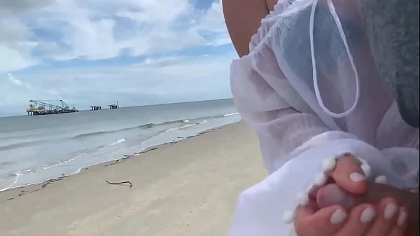 Crazy milf jerks me off in front of passersby