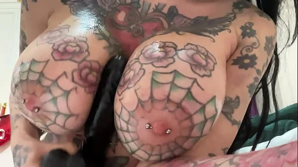 huge pierced tits filled with oil