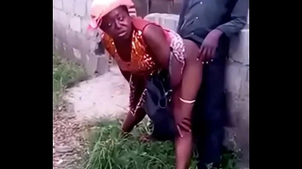African woman fucks her man in public