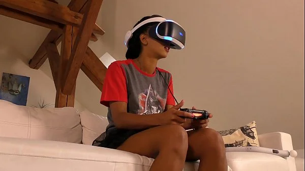 Isabel flashes her pussy and ass under her panties with a tshirt and she has a new game in her Playstation VR but she needs..