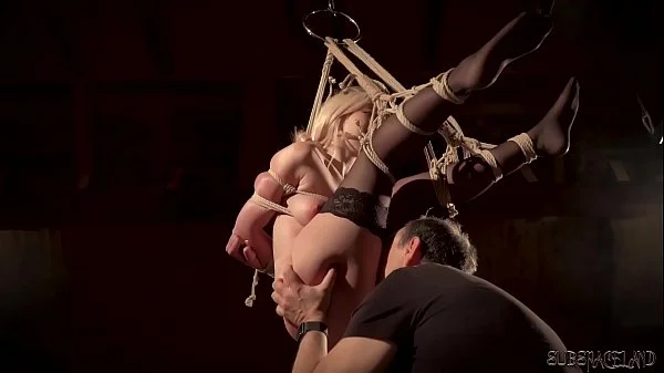 Teen enduring submissive sex in dungeon and is made to cum with a sex toy