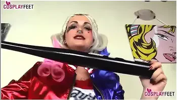 Harley Quinn In Black Pantyhose Gives Baseball Bat Footjob
