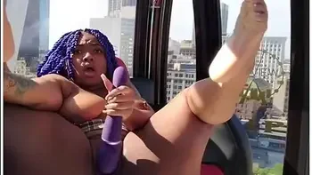 Thick Blue Hair Squirting On The Ferris Wheel