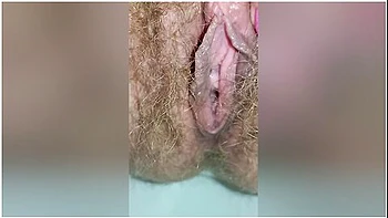 Detailed Close-up Footage Of A Hairy Pussy Girl Urinating From Her Pee Hole And Farting Loudly