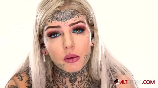Behind the scenes for Amber Luke's new face tattoo
