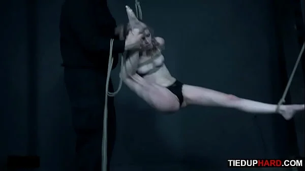 Petite BDSM slave gagged and caned by master