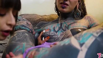 Tattooed Babe Gapes Her Friend's Asshole During Hot Lesbian Sex