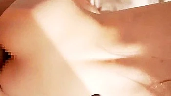 He thrusts into her from behind, slapping her ass, and then fucks her in the cowgirl position, making her squirt.