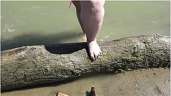 Fat Bare Legs With Red Pedicure Walk Along The Bank Of The River, Fetish