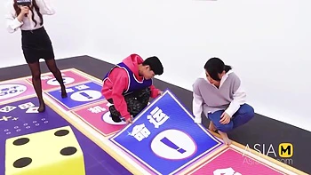 An Asian Group Plays An Undressing Game