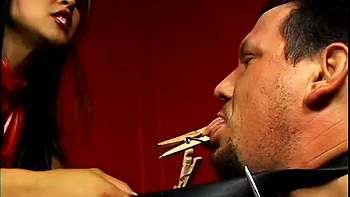 Asian dominatrix having her way with her slave