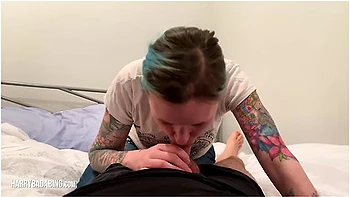 Cute Tattooed Girl Gives Head On Bed & Spits Out Cum