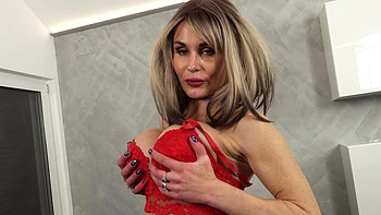 Czech model Laura Crystal enjoys solo sex with her big fake boobs