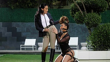 Vicki Chase and Kazumi enjoy a passionate lesbian encounter on the bed