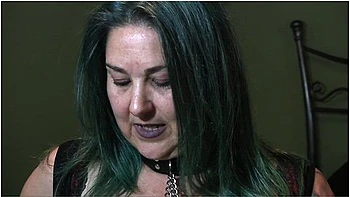 Chastity Smokes Wearing A Collar And Nipple Clamps