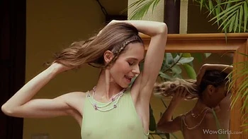 Skinny and young hottie Leona Mia is touching her shaved pussy