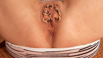 Beautiful hottie Marina Rene shows off her nice pierced vagina