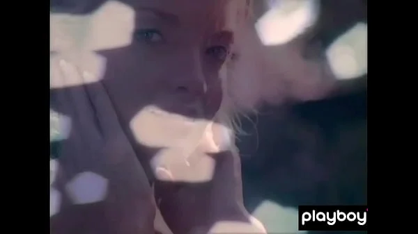 Big boobed blondie Kimberly Holland taking off her sexy uniform outdoor