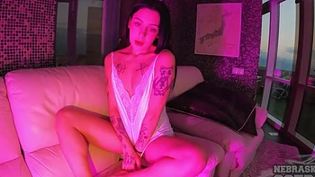 Abbie Storm Aka Dora plays with her favorite dildo on the sofa