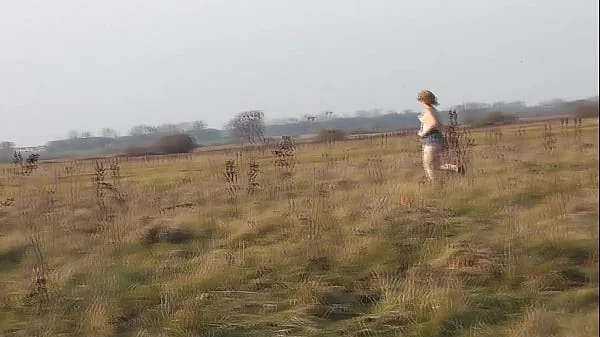 Naked in public. Nude in public. Outdoors without panties and bra Sexy MILF Frina play Sport at stadium outside. Public. No panties. Naturist. Outdoor. Nudist