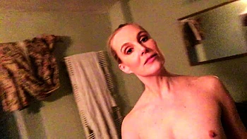 Amateur redhead milf sucking and foot job scene