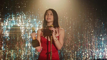 Manuel Ferrara and Liz Jordan enjoy passionate sex on the sofa.