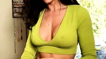 Busty curly brunette with big boobs fucks on couch