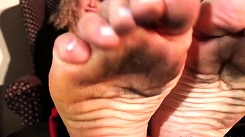 Blonde foot fetish solo on Devil's Footstool